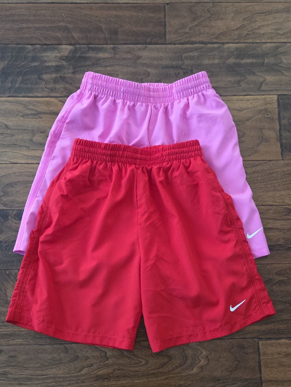 Nike Youth Athletic Shorts - Red and Pink. Size Youth Large.